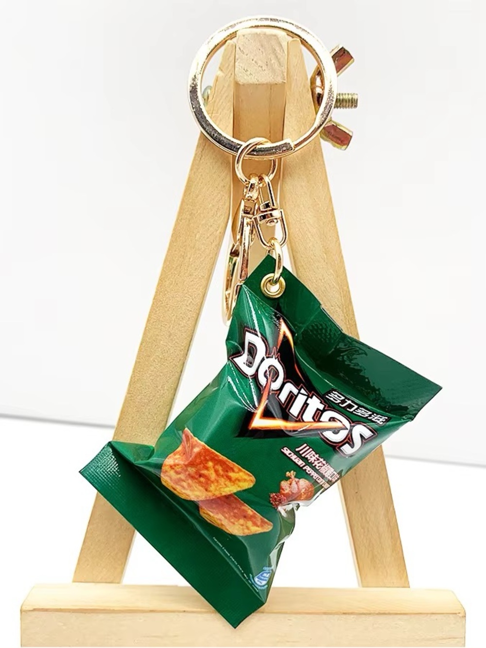 Green Snack-Style Keychain with Gold Hardware